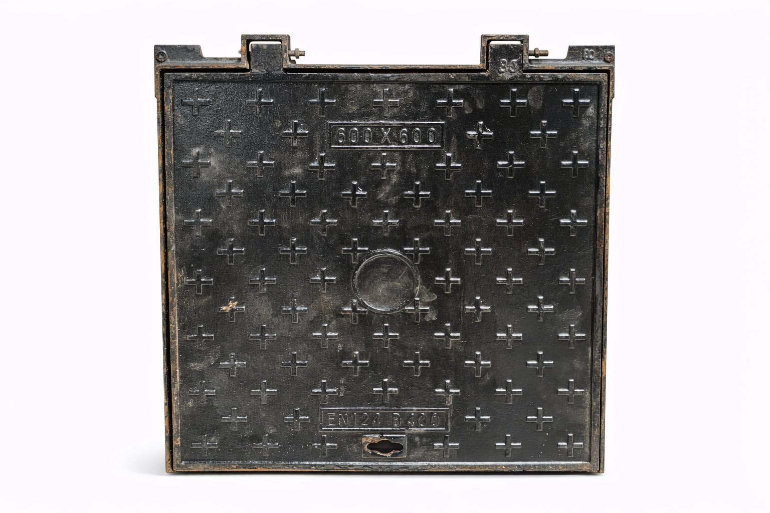 Plaque d'égout métalique