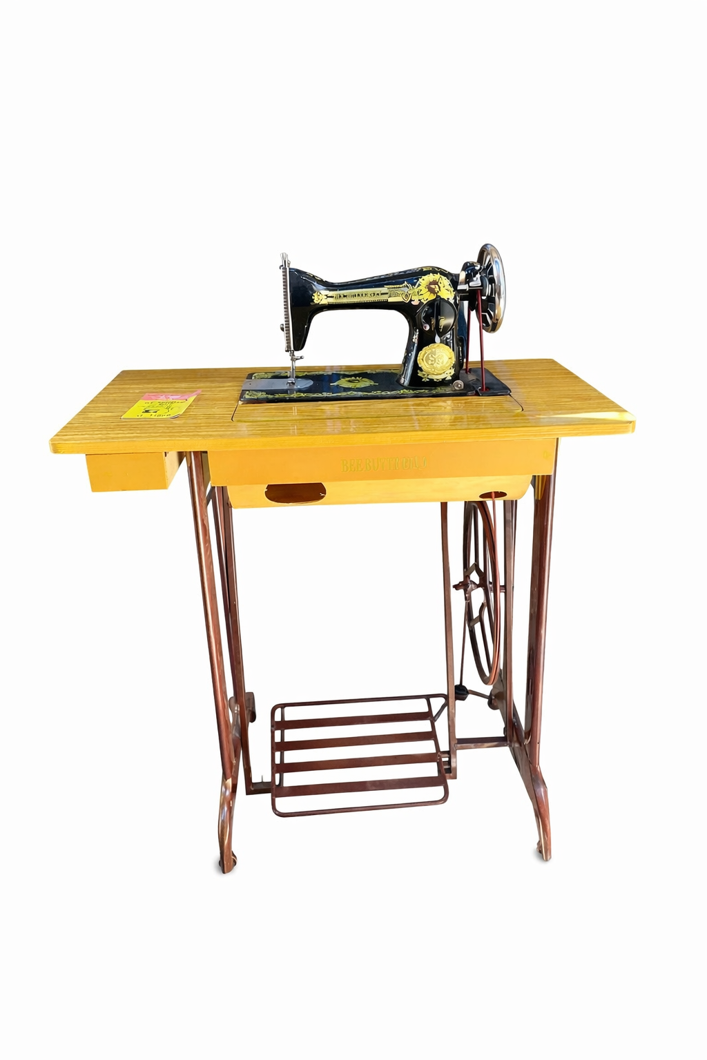 Machine Singer à coudre ancienne sur table en bois