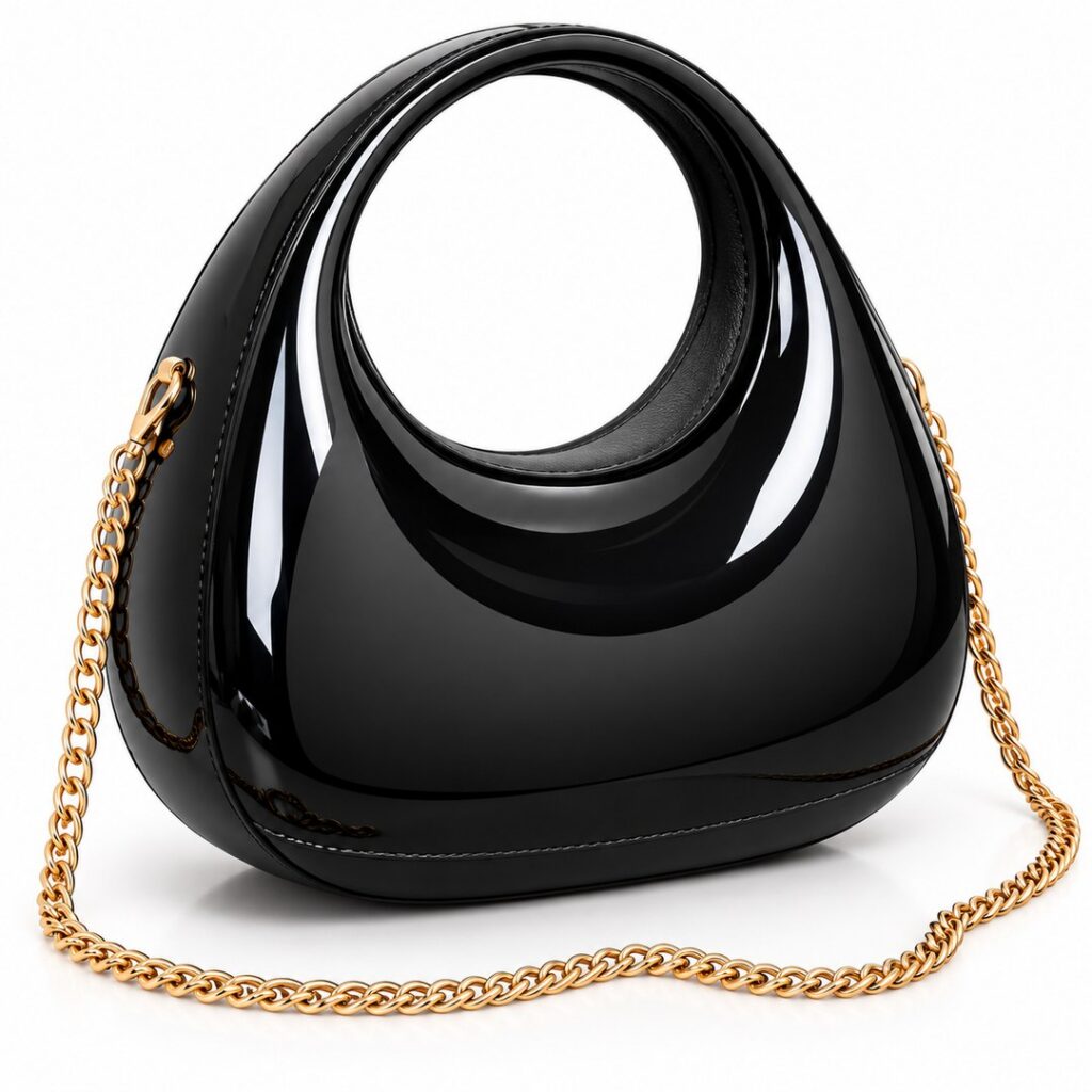 Sac à main femme noir brillant avec chaîne dorée